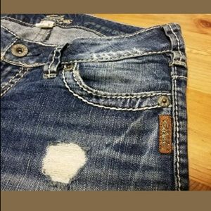 Silver Jeans "Pioneer" Distressed Bootcut Denim